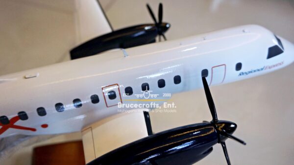 Saab 340 Rex Airlines Aircraft with detailed craftsmanship.